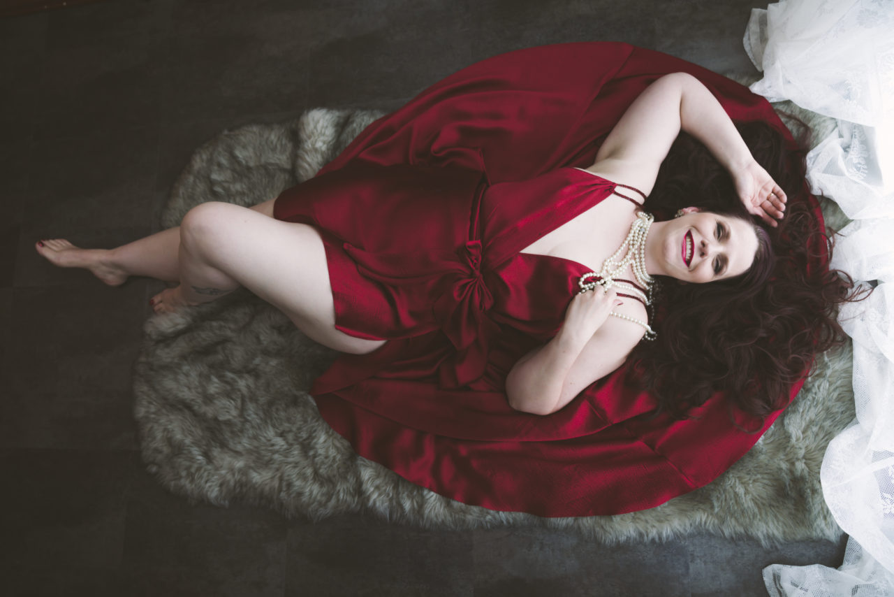 Valentine boudoir self love body positive lovely red dress happy woman Seattle portrait fur pearls dreamy