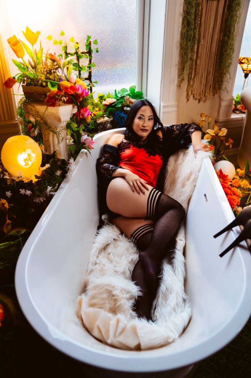 Bathtub boudoir session with high stockings